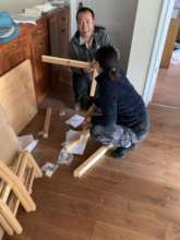 Volunteers assembling furniture