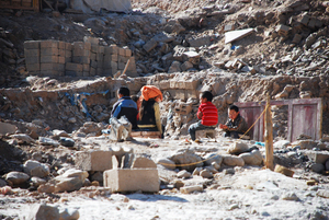 children playing in the rubble