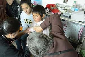 Dr. Julie Carpenter with patient