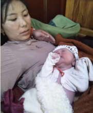 Newborn and mom at Clinic