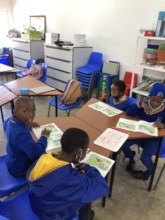 Buddy Reading with a group of Grade 3 learners.