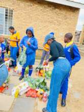 Diepsloot families collecting food parcels