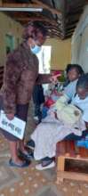 Breast feeding instruction at Momoniat dispensary