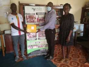 Delighted librarians at UDS receive their router