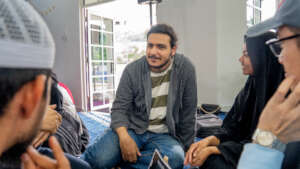 Khalil, scholar/intern, at a community event