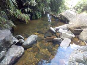 Stream bordering private land currently on sale