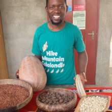 Staff member Sibusiso with saved seeds