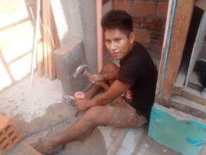 Building new housing modules at Hogar Policarpo