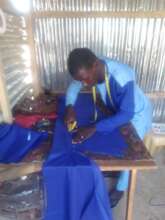 A former student now has his own tailoring shop