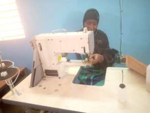 Participant at ANHL using new sewing machine