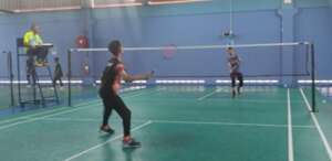 Friendly badminton match to start the conversation