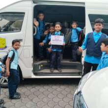 Students riding one of RCS Kedah's van