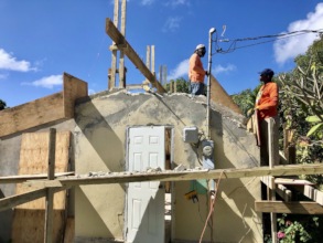 Work begins on a hurricane damaged home