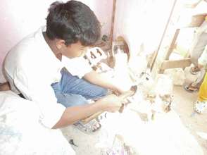 At his workplace