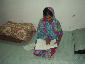 Husna studying at home