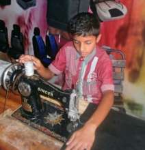 Sowing car seats at a workshop