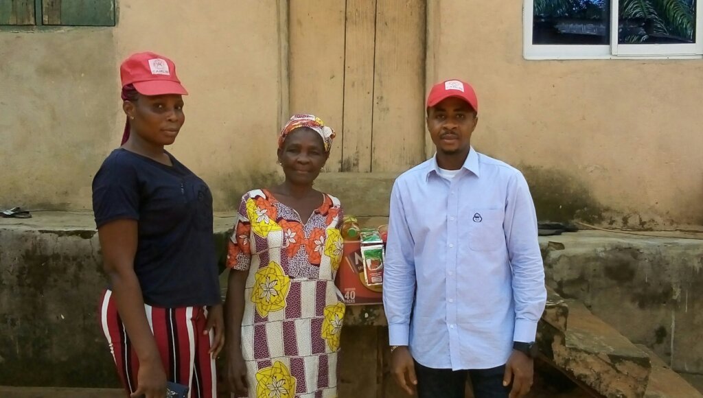 Our team with a poor widow