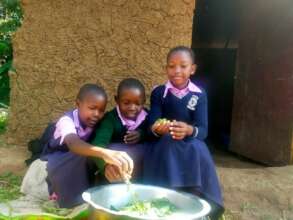 Noreen, Adelaide and Kezia Prepare Vegetables