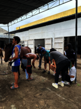 Locals receiving farrier training.