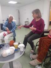 Carers enjoy knitting & chat at a coffee morning!