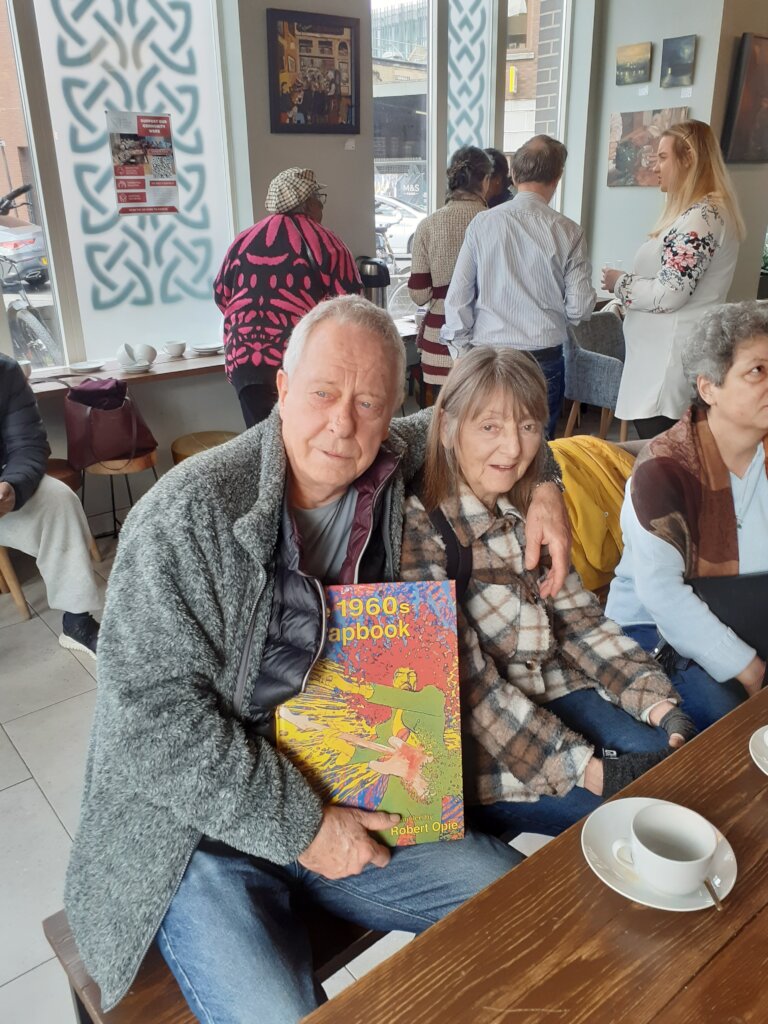 Bruce and his partner with the reminiscence book