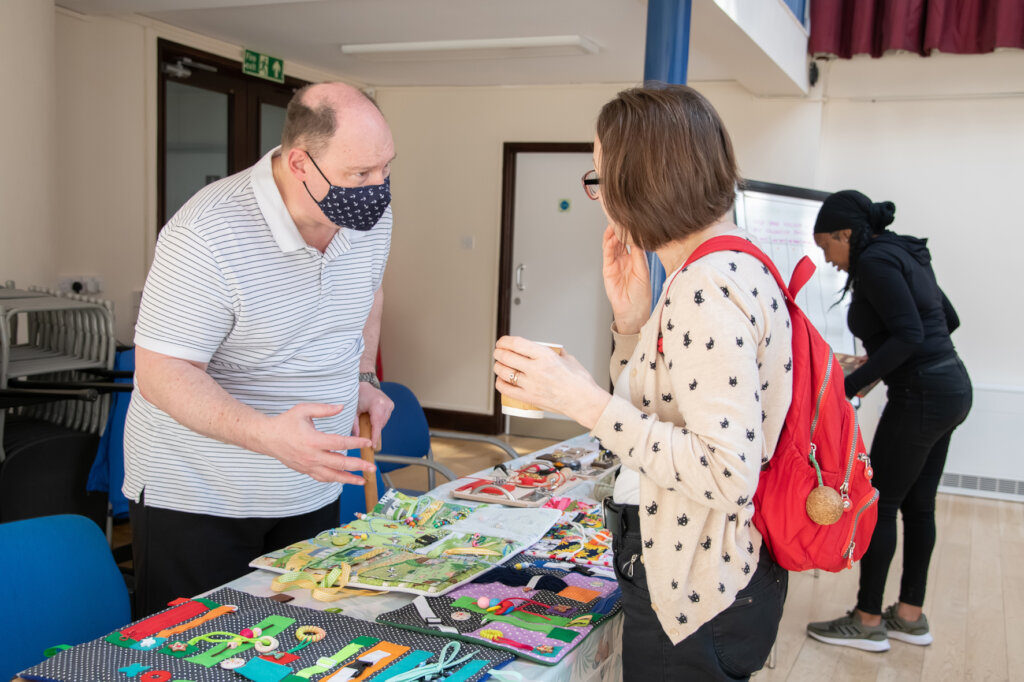 Carer Richard demonstrating products at Launch.