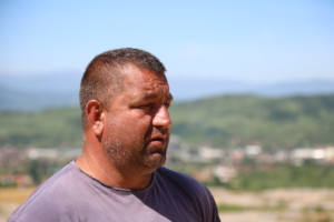 Samir, a Bosnian miner, on the willow plantation