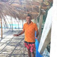 Ruben in front of new hatchery