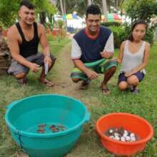Locals with turtle eggs