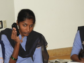 Prathibha listening to her teacher - Daisy player