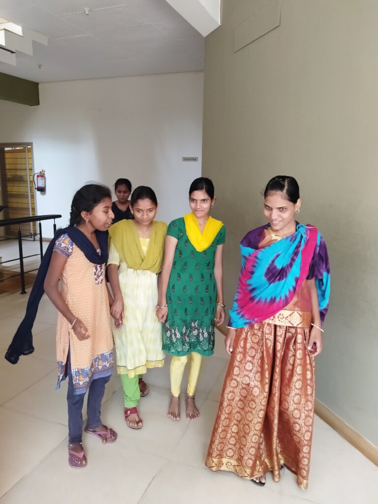 VI girls in front of  the accommodation facility