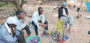 Discussing progress with Soko Moko Group Members