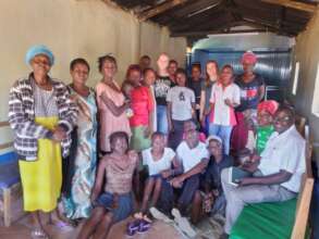 Happy Umoja Steps Group with Visitors