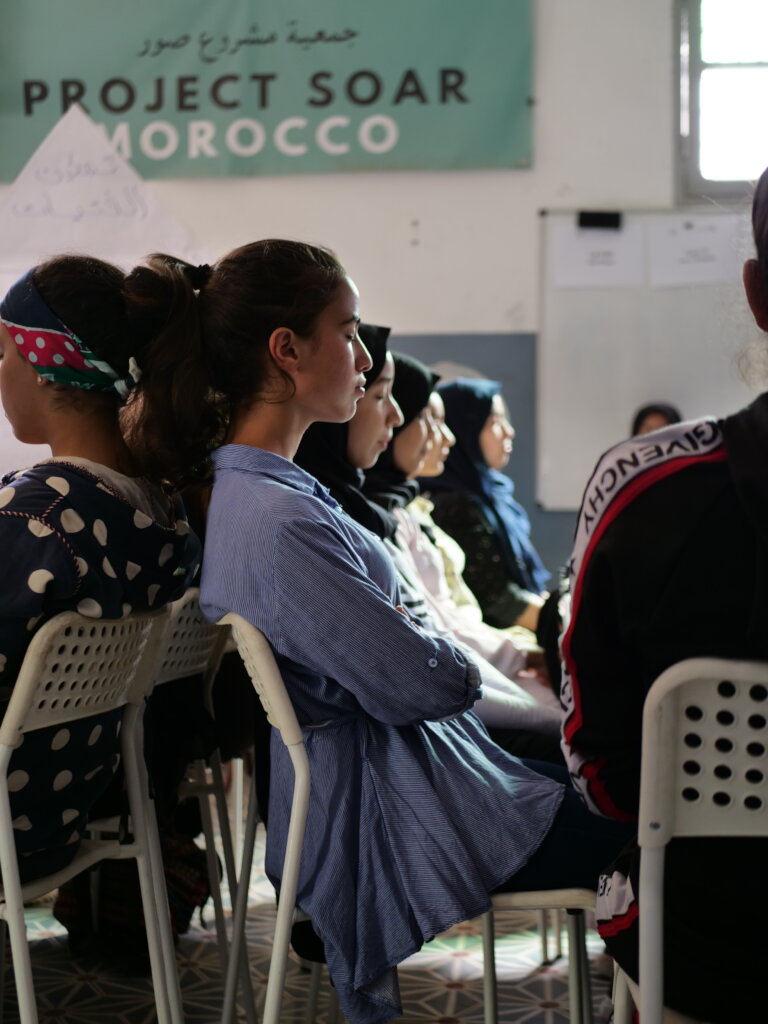 Girls take part in a guided meditation session
