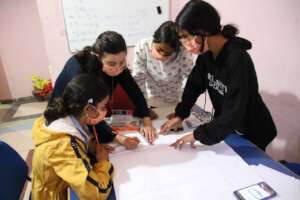 Soar Girls work on a team building activity