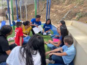 Scholars leading activities at the "Literacy Day"