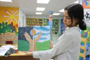 High school scholar Shelsy in art class