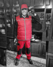 Danik is proud of his winter uniform, and his job