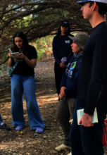 Student reads the Kaufman field guide