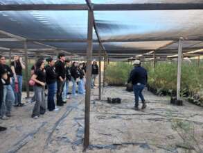 Maribel leads a tour inside the nurseries