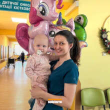 Elinka celebrates a successful surgery at WUSPMC