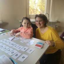 A young girl begins Polish lessons