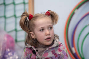 Mariia*, 7, plays at our Child Friendly Space.