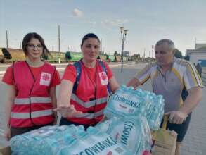 Caritas SPES providing drinking water (c) Caritas