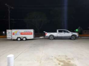 Hand off of uhaul full of medical supplies