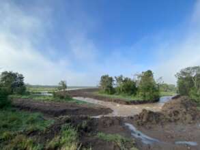 The burst banks of Elephant Dam on Ol Pejeta