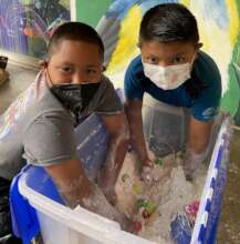 First time playing with sensory bins at the school