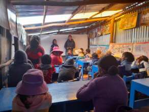 Sharing the story from the book with the class