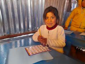 Younger kids enjoying books