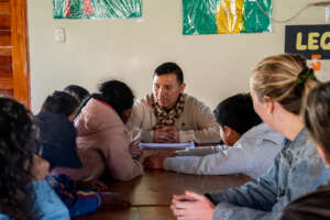 Children fully engaged as they listen to a story